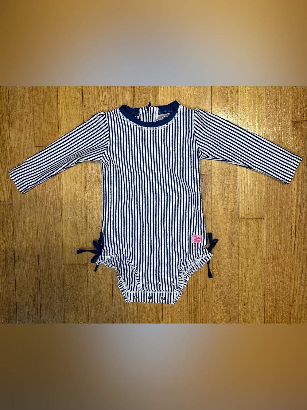 Ruffle Butts Navy and White Striped Long-Sleeve One-Piece